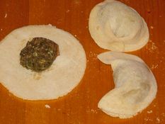 Pelmeni with filling grinded meat.