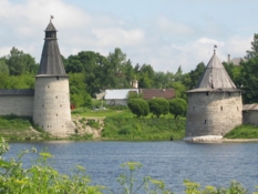 Pskov fortress. The estuary of the Pskova River. Vysokaya (High) and Ploskaya (Flat) Towers.